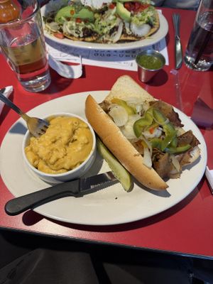 Philly cheesesteak. Cheese added after the fact! Mac n cheese was the best!  at The Chicago Diner - Lakeview in Chicago