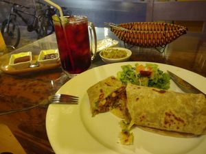 Cauliflower burrito. Was ok. Guac so so. Hibiscus 🌺 was good at Blue Parrot Mexican Grill in Da Lat