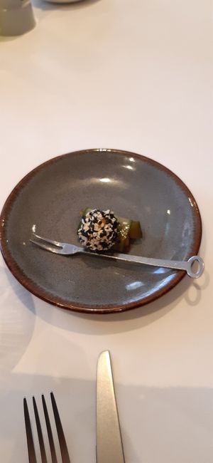 Melon dipped in seeds on a cucumber slice at 1910  in Eindhoven