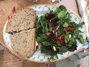 Hummus and tomato sandwich with the best salad 🥗  at Bizou Cafe in Corfu