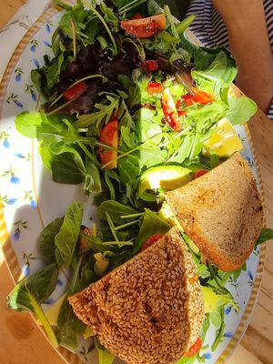 Avocado sandwich with gluten-free bread and a huge side salad at Bizou Cafe in Corfu