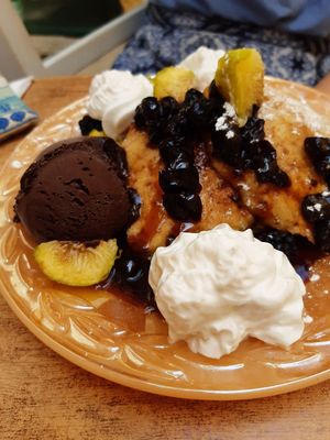 Sweet pancakes with cherries at Bizou Cafe in Corfu