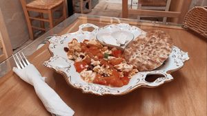 Greek Tofu Scramble with Olives, Tomato & Warm Pita 😋😋😋 at Bizou Cafe in Corfu