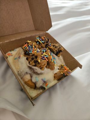 Cinnamon roll with cookie dough and sprinkles at Cinnaholic in Naperville