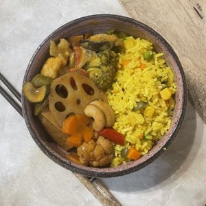 Pumpkin seed fried rice, tofu curry & kong pao tofu  at Root Vegetarian in Cairns