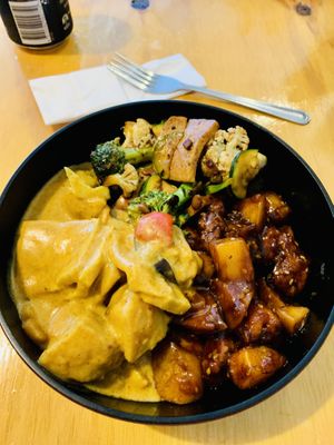 3 selections from their buffet: sweet and sour “chicken”, black pepper tofu, and tofu curry.. all yummy. (Soya chicken my favourite)  at Root Vegetarian in Cairns