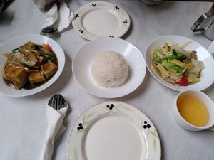 Left to right: Sautéed beancurd, rice, and vegetables with jasmine tea at Jade Garden in Weymouth