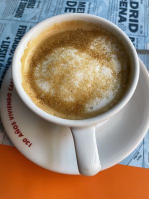 Cafe con leche with oat milk   at La Libre in Madrid