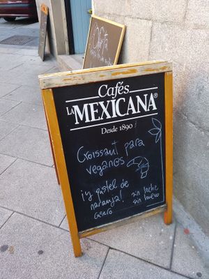 sign with vegan options at La Libre in Madrid