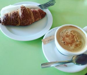 Vegan croissant with coffee and rice milk at La Libre in Madrid