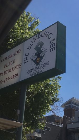 Sign out front at Bumbling Bee Vegan Junk Food in Boulder