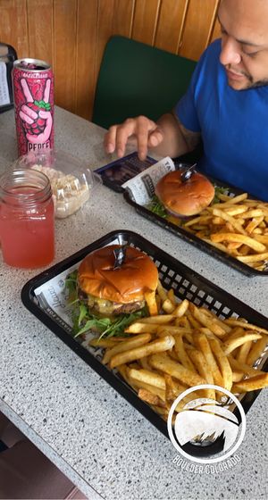 Food came fast and was amazing! Husband had the black bean and pumpkin maverick burger and I had the impossible burger. Everything was so flavorful.  at Bumbling Bee Vegan Junk Food in Boulder