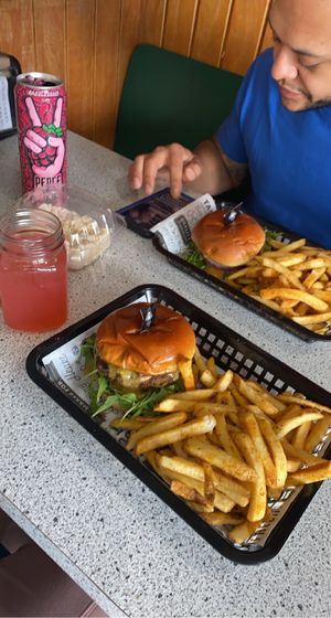 Burger and Fries with homemade tea and rice crispy treat  at Bumbling Bee Vegan Junk Food in Boulder