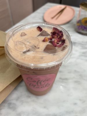 Rose latte with rose petals  at Coffee And Plants in Pasadena