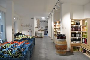 Vegetables on the left, wines and beers on the right at Les Petits Producteurs in Liege