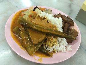 Curry with okra, sweet cabbage dish and potatoes with mock meat. at JuFu Vegetarian - Restoran Makan Sayuran in Alor Setar
