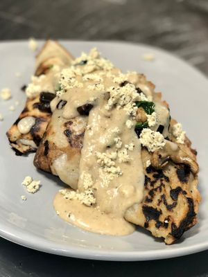 Fungi crepe with homemade cheddar sauce  at Paliottis Westside in Maple Ridge