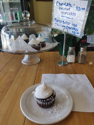 Chocolate coconut cupcake, served with powdered sugar on top! at Sluggo's North Vegetarian Cafe in Chattanooga