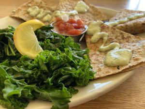 Pesto and portobello quesadilla with steamed kale  at Sluggo's North Vegetarian Cafe in Chattanooga