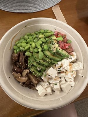 Poke bowl with tofu, edamame & more  at Ho' oponopono in Santander