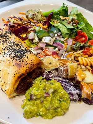 Vegan sausage roll and salad platter at Found in Brighton