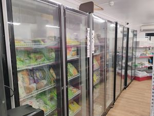 Non-vegan (check for e.g. dairy in ingredients) Asian shop at the rear of the restaurant at Su Vegan Buffet in West London