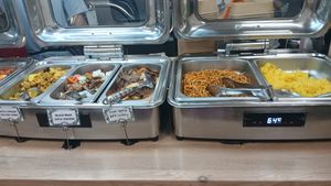 More hot dishes. Black bean "chicken" was chewy but tasty. The yellow curry was amazing. at Su Vegan Buffet in West London