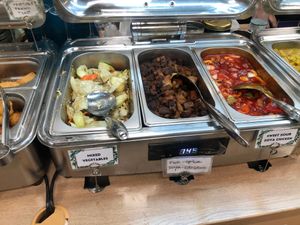 Buffet selection inc 5 spice chicken and sweet and sour chicken. at Su Vegan Buffet in West London