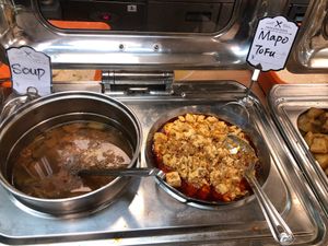 Soup and a Mapu Tofu dish. at Su Vegan Buffet in West London