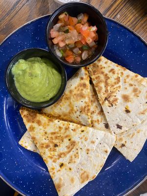 Choridilla - Plant-based chorizo and plant-based cheddar in a flour tortilla with sides of pico de Gallo and guacamole. at ROOST in York