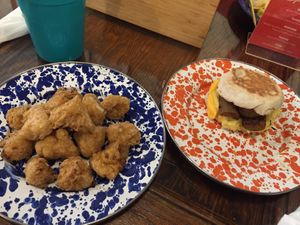 Fried cauliflower and a sausage, just egg and violife on an English muffin (all vegan)  at ROOST in York