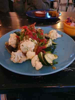 The roasted stuffed pepper with lovely peanut-spinach stew at Vegane Glorie in The Hague