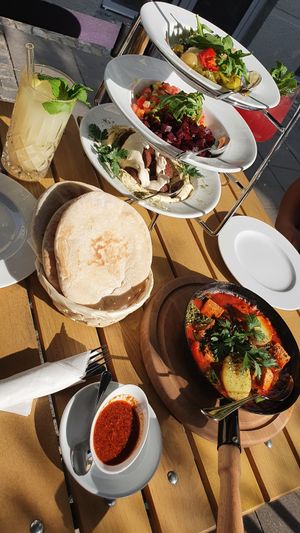 Mezze for two and vegan Shakshuka with spinach and tofu at YAFA in Stuttgart