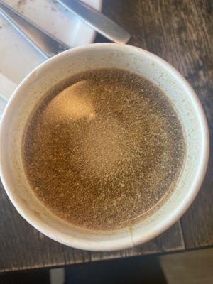 Coffee with some curdled oat milk    at Seeds Cafe in Fornebu