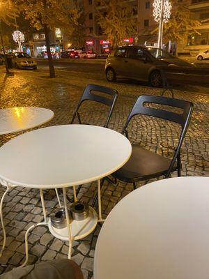 My seat…covid changes today so I’m outside in the rain. 😂 at Radhe Krishna in Lisbon