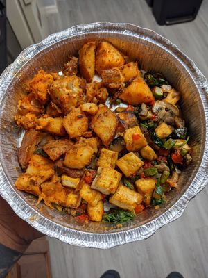 Grilled tofu scramble with vegan home fries. They have regular home fries too, so that distinction is important. This scramble is really delish. at Toast Coffeehouse in Patchogue