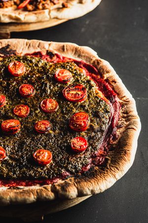 Pizza capresse
Handmade pizza with vegan chesse, cherry tomato and pesto sauce at Lounge del Brujo Vegan Kitchen & Bar Cayma in Arequipa