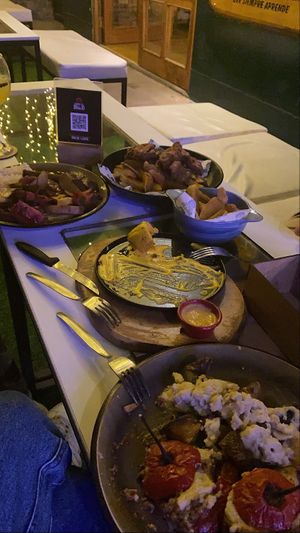 Vegan Lomo saltado, Peruvian Wantans, Salchipapas with vegan chicken and Rocoto relleno with cashew cheese and also fried yuca with dip  at Lounge del Brujo Vegan Kitchen & Bar Cayma in Arequipa