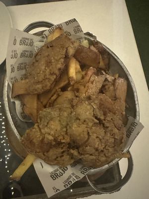 Poor picture of Salchipapa Broaster  at Lounge del Brujo Vegan Kitchen & Bar Cayma in Arequipa