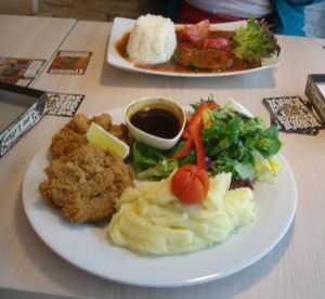 Schnitzel (front) and sea slices (back) at Loving Hut - Na Porici in Prague