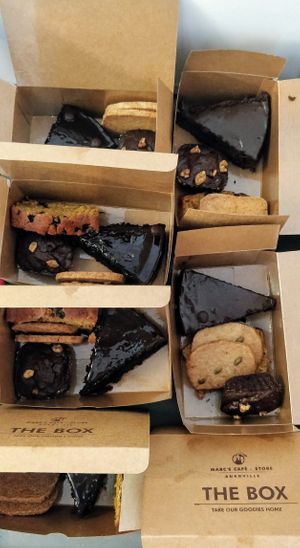 Take away assortment of vegan cake and biscuits. at Coffee Ideas in Auroville