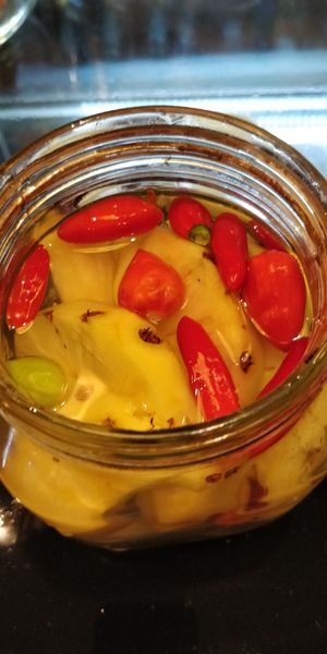 Fermentation of pineapple and chili at Coffee Ideas in Auroville