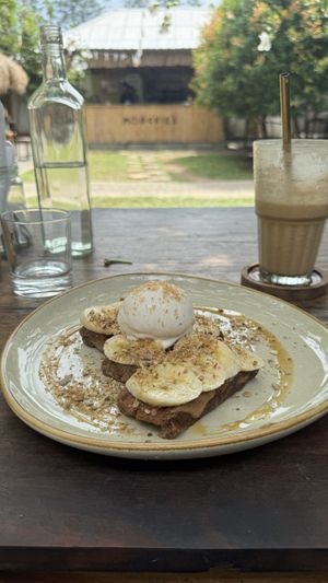 Vegan banana French toast and coco coffee  at Moochie's Cafe in Weligama