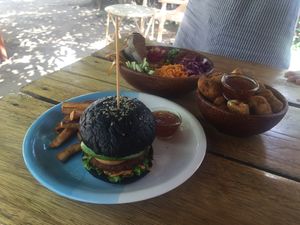 Veg burger, falafel bowl, and cauliflower popcorn! at Moochie's Cafe in Weligama