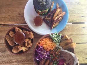 Veg burger, falafel bowl, and cauliflower popcorn! at Moochie's Cafe in Weligama