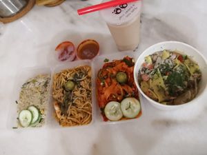 Laksa goreng, vegetables fried rice, Kway teow goreng and grill chicken with spinach pasta at Bazil Kitchen in Central Singapore