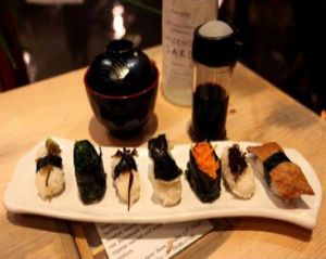 7 pieces of sushi including oriental herbs, seaweed, and wild plants at Itadakizen in London
