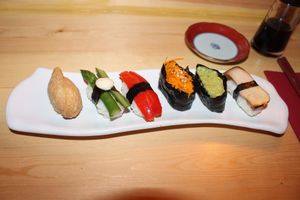 Sushi at Itadaki Zen in London. These tasted even better than they look. Each were infused with a different flavour - I can't remember what they all were but I remember one was garlic. Amazing. We were seated at the seats at the bar underground with a pretty cool vibe to the whole thing. They also had brilliantly terrible cover songs of classics such as Bohemian Rhapsody playing and the three of us were entertained all evening trying to guess what on earth the songs were supposed to be. The music was perhaps the highlight of the whole experience hahaha.  at Itadakizen in London