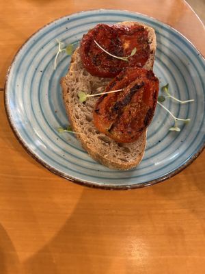 Roasted tomato toast   at Sip and Wonder in Alicante
