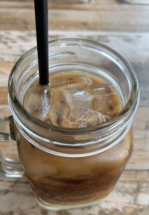 Iced latte with almond milk. at Santos Coffee With Soul in Oranjestad